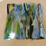 Combining Steel and Glass in Sculptural Art